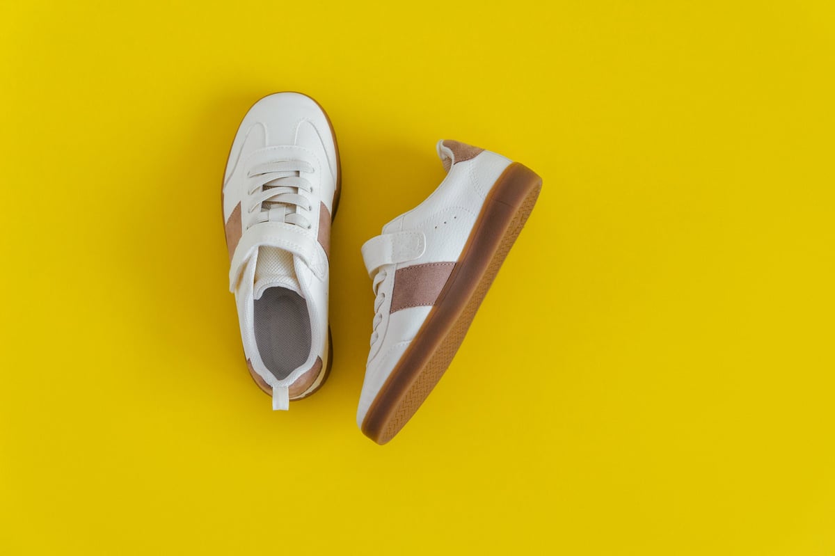 Minimalist sneaker on a bright yellow background